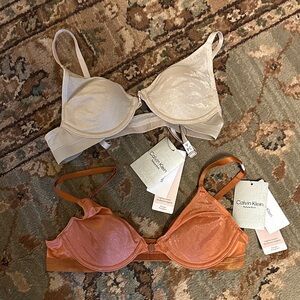 2 NWT 34A Calvin Klein Tan and Orange Bras